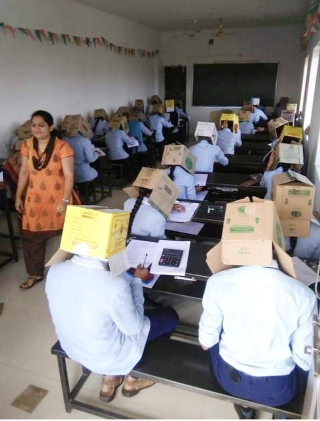 印度考场全是“大头娃娃”，学生考试头戴纸箱：防作弊